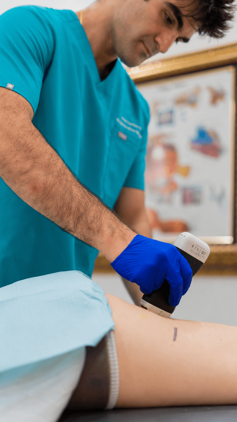 A physician using ultrasound during a regenerative medicine treatment